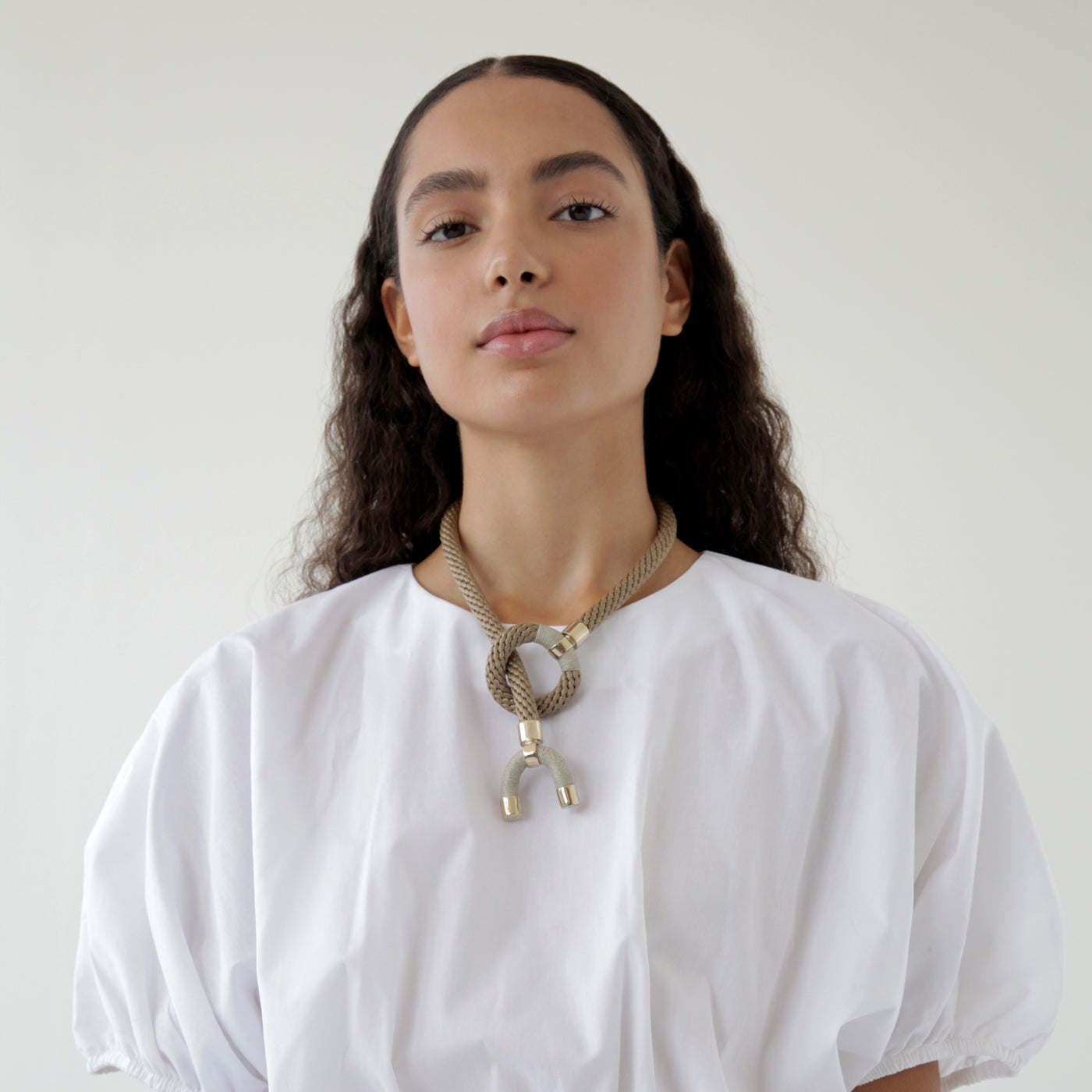 Astarte horn necklace on model: shop ethical handmade jewelry at petite protea: chicago jewelry boutique