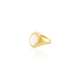 gold etched signet ring with oval faceted mother of pearl stone and an orange blossom and hatched motif on the back. fair trade jewelry online in chicago 