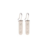 Sterling silver column hook earrings hand stamped with XOX by artisans in mexico, fair trade, hanging