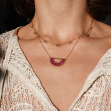 Artisan necklace with tanzanite and gold, handmade in Tanzania. Shop in Chicago and online at Petite Protea.