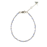 Handmade tanzanite silver arrow charm bracelet, ethical artisan gift — Petite Protea
